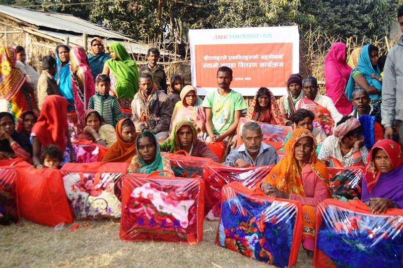 IME Foundation Provides Blankets to Cold Victims