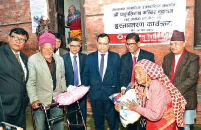 Everest Bank Distributes Winter Clothes in Old Age Home