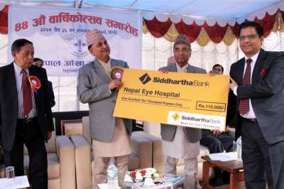 Siddhartha Bank extends financial support to Nepal Eye Hospital