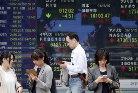 Asian Stocks Shaken by Blast in Poland; Dollar Gains